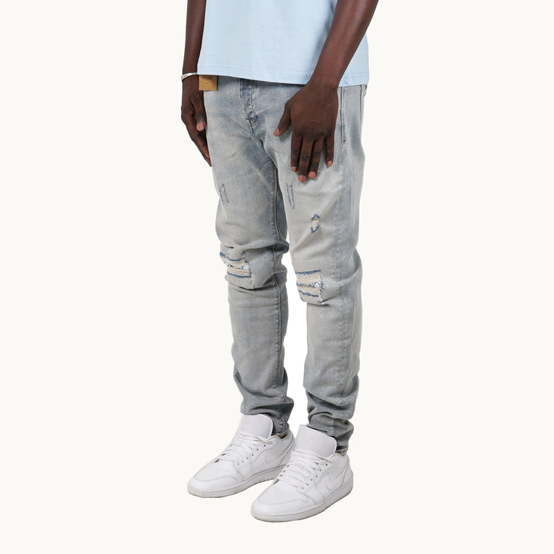 LIGHT INDIGO SKINNY FIT JEANS WITH BANDANA PATCHES